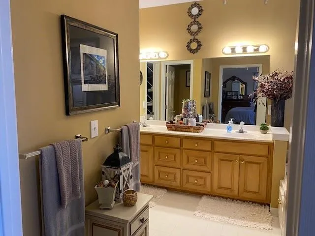 a view of a hallway with wooden shelves