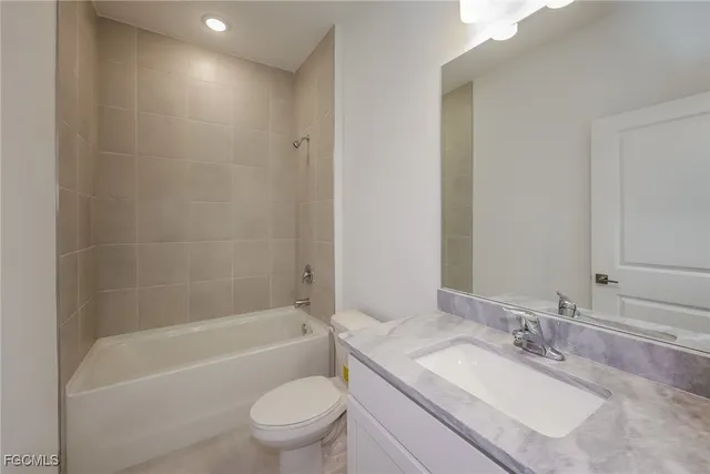 a front view of house with yard and outdoor seating