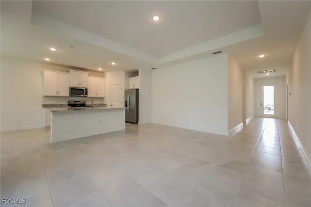 a view of a kitchen with a sink