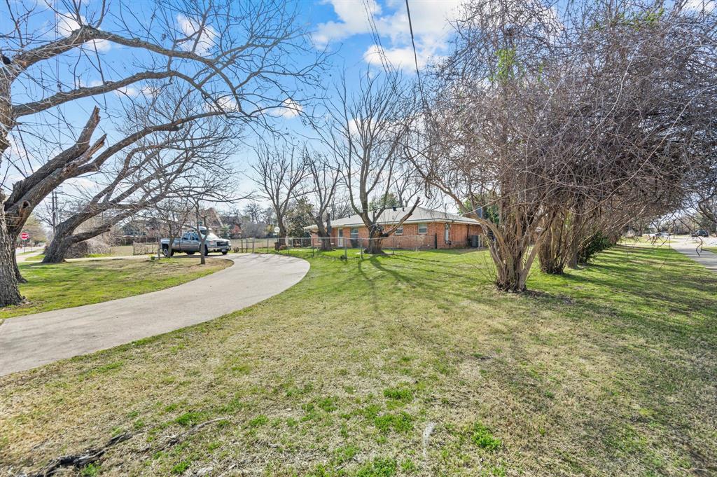 5804 Pleasant Run Road, Unit LAND Colleyville, TX 76034 - Photo 13 of 25 a view of a house with yard and tree s