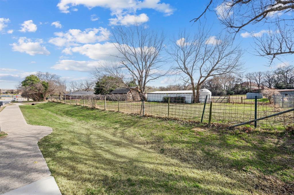 5804 Pleasant Run Road, Unit LAND Colleyville, TX 76034 - Photo 18 of 25 a view of a park with large trees