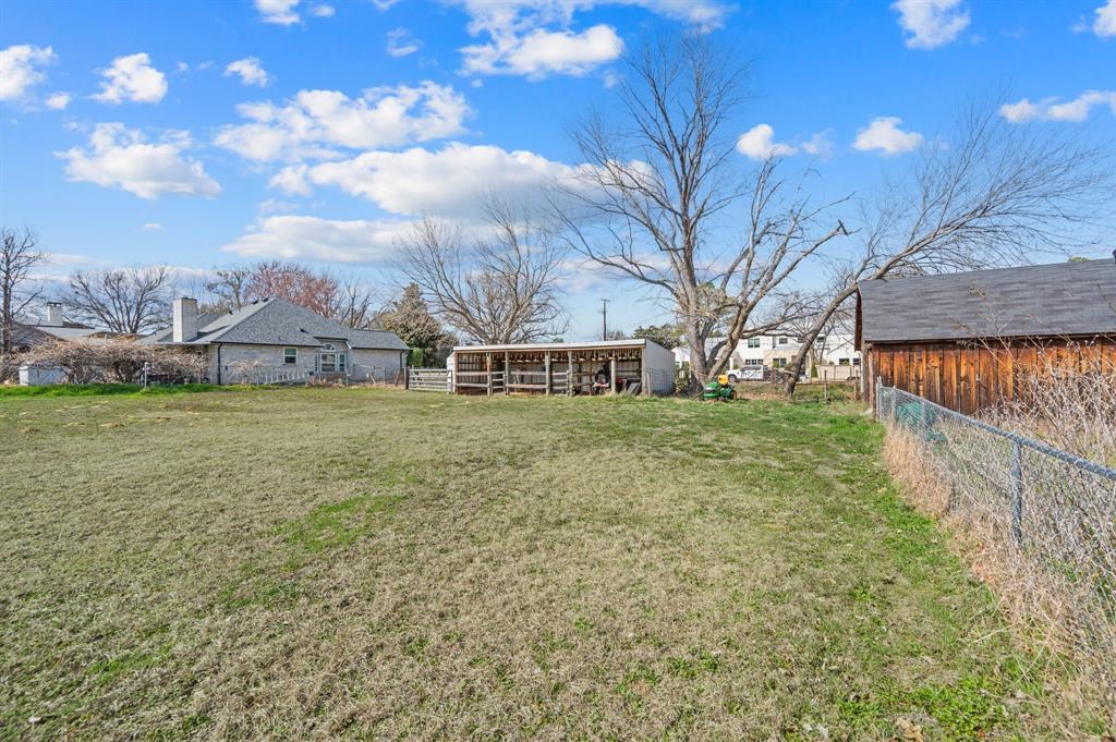 5804 Pleasant Run Road, Unit LAND Colleyville, TX 76034 - Photo 6 of 25 a view of a outdoor space with garden