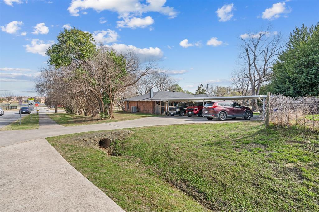 5804 Pleasant Run Road, Unit LAND Colleyville, TX 76034 - Photo 8 of 25 a view of outdoor space with garden and trees
