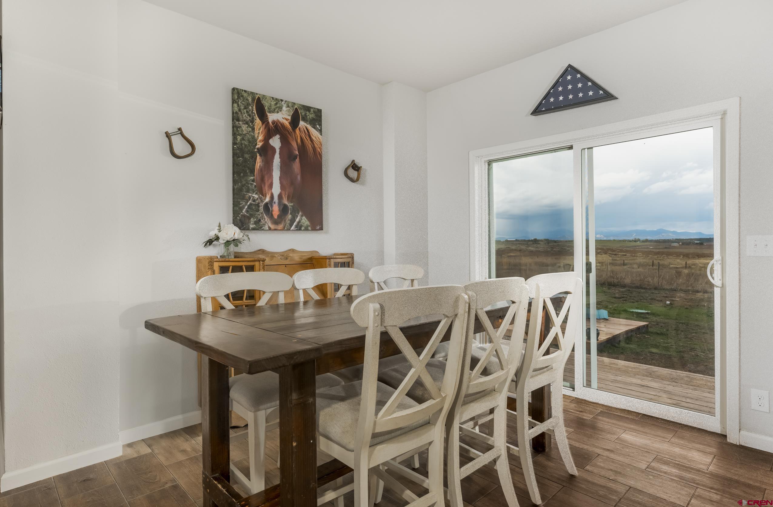 270 Rock Ranch Ignacio, CO 81137 - Photo 14 of 35 a view of a dining room with furniture and wooden floor