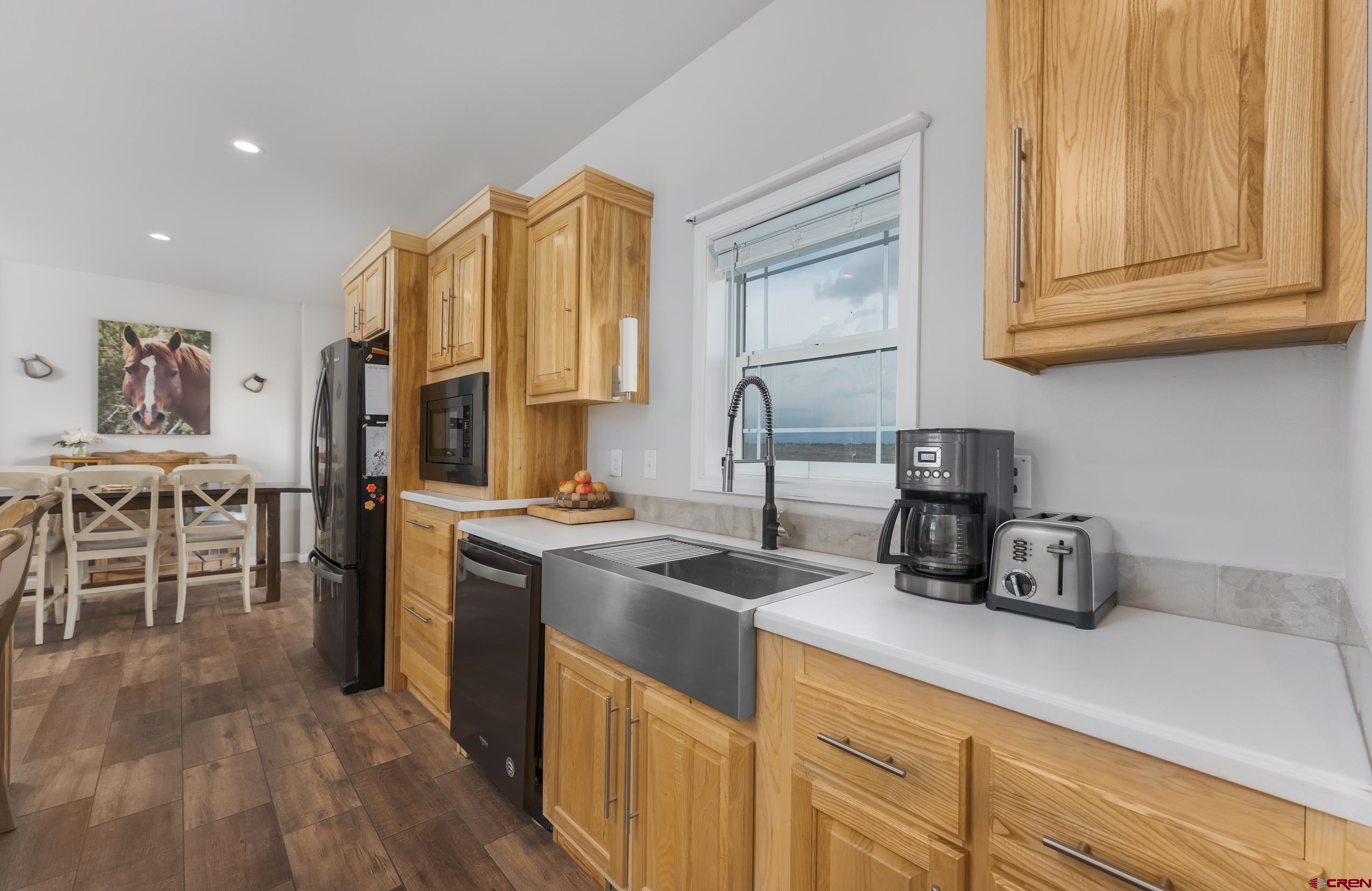 270 Rock Ranch Ignacio, CO 81137 - Photo 8 of 35 a kitchen with stainless steel appliances granite countertop a stove a sink and a refrigerator
