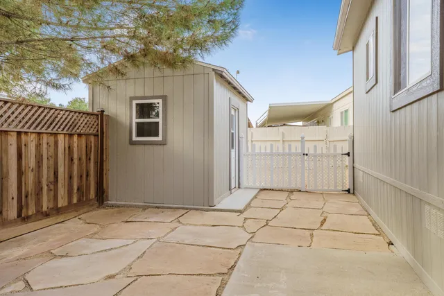 a view of a pathway along a building