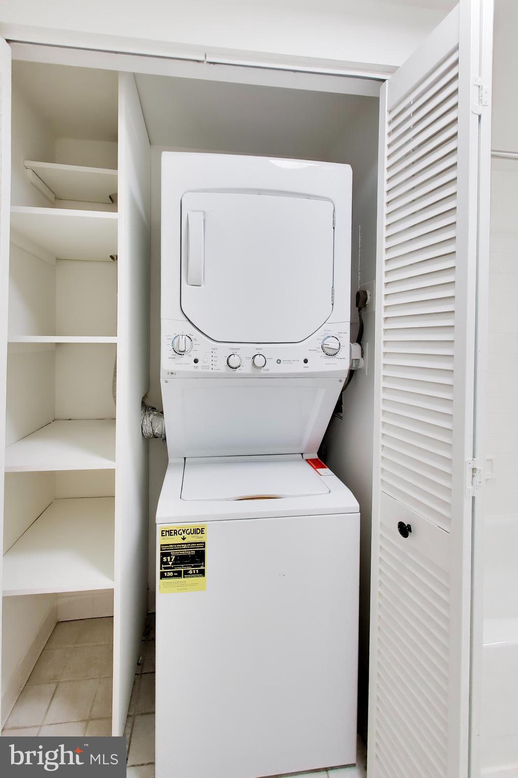 1730 16th Street Northwest, Unit 14 Washington, DC 20009 - Photo 15 of 17 a utility room with dryer and washer