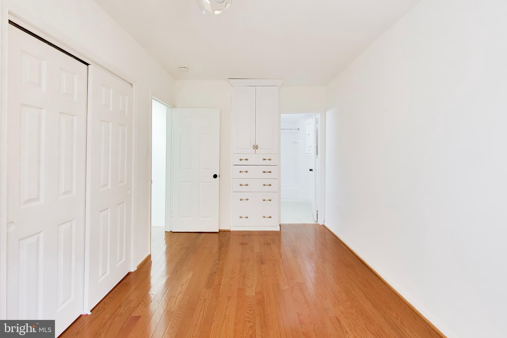 1730 16th Street Northwest, Unit 14 Washington, DC 20009 - Photo 9 of 17 a view of kitchen with wooden floor