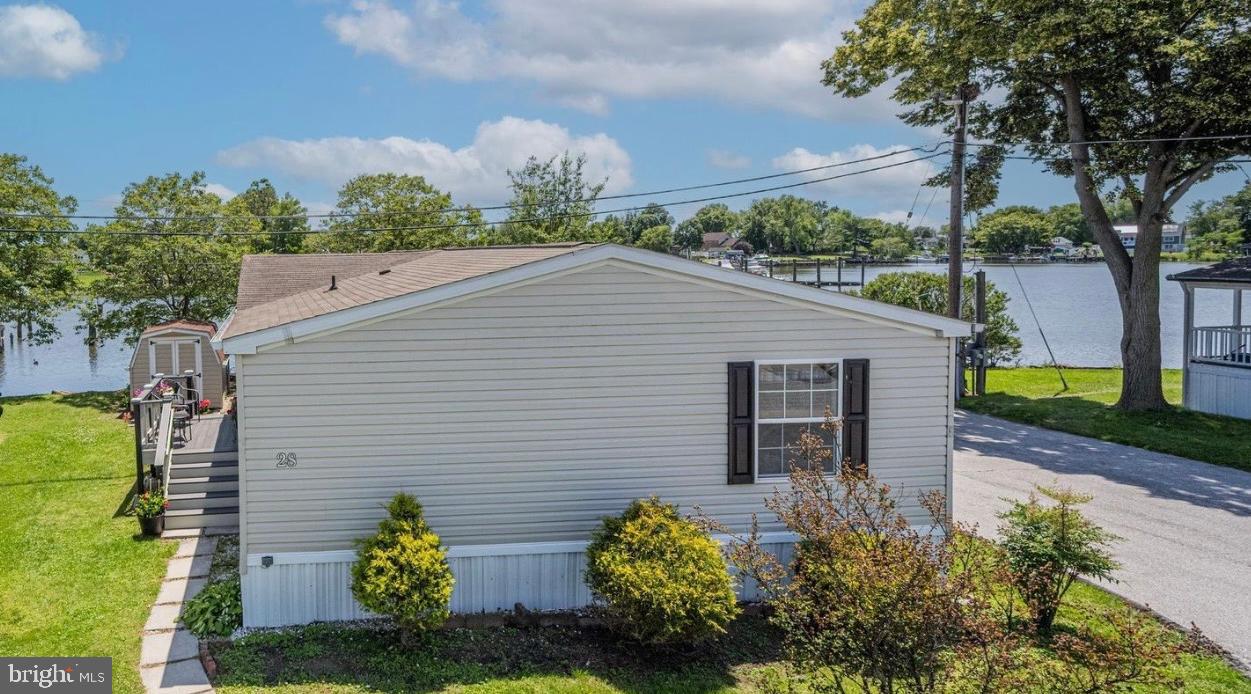 28 Shore Road Sparrows Point, MD 21219 - Photo 1 of 20 a aerial view of a house with plants and a garden