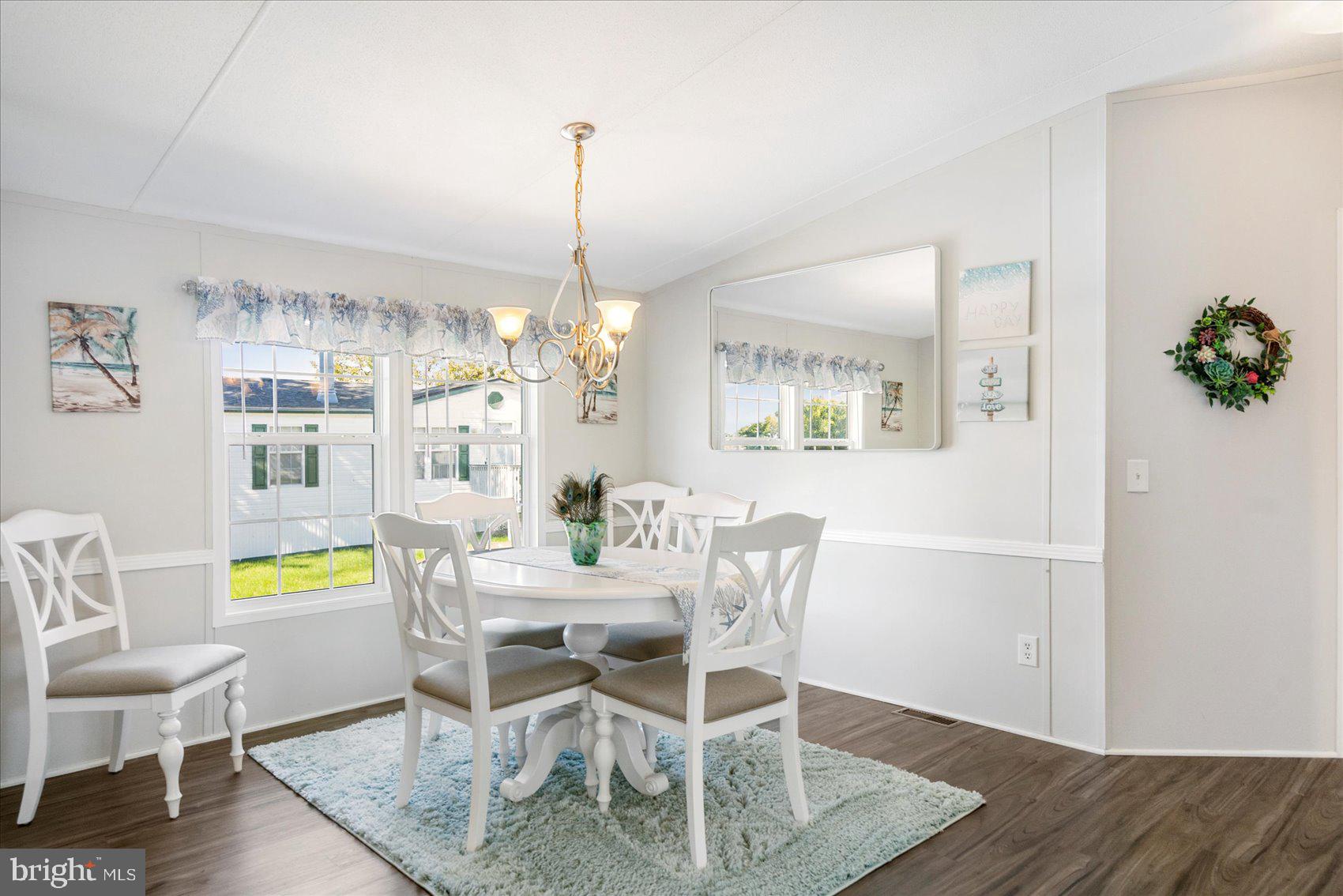 28 Shore Road Sparrows Point, MD 21219 - Photo 13 of 20 a dining room with furniture and chandelier