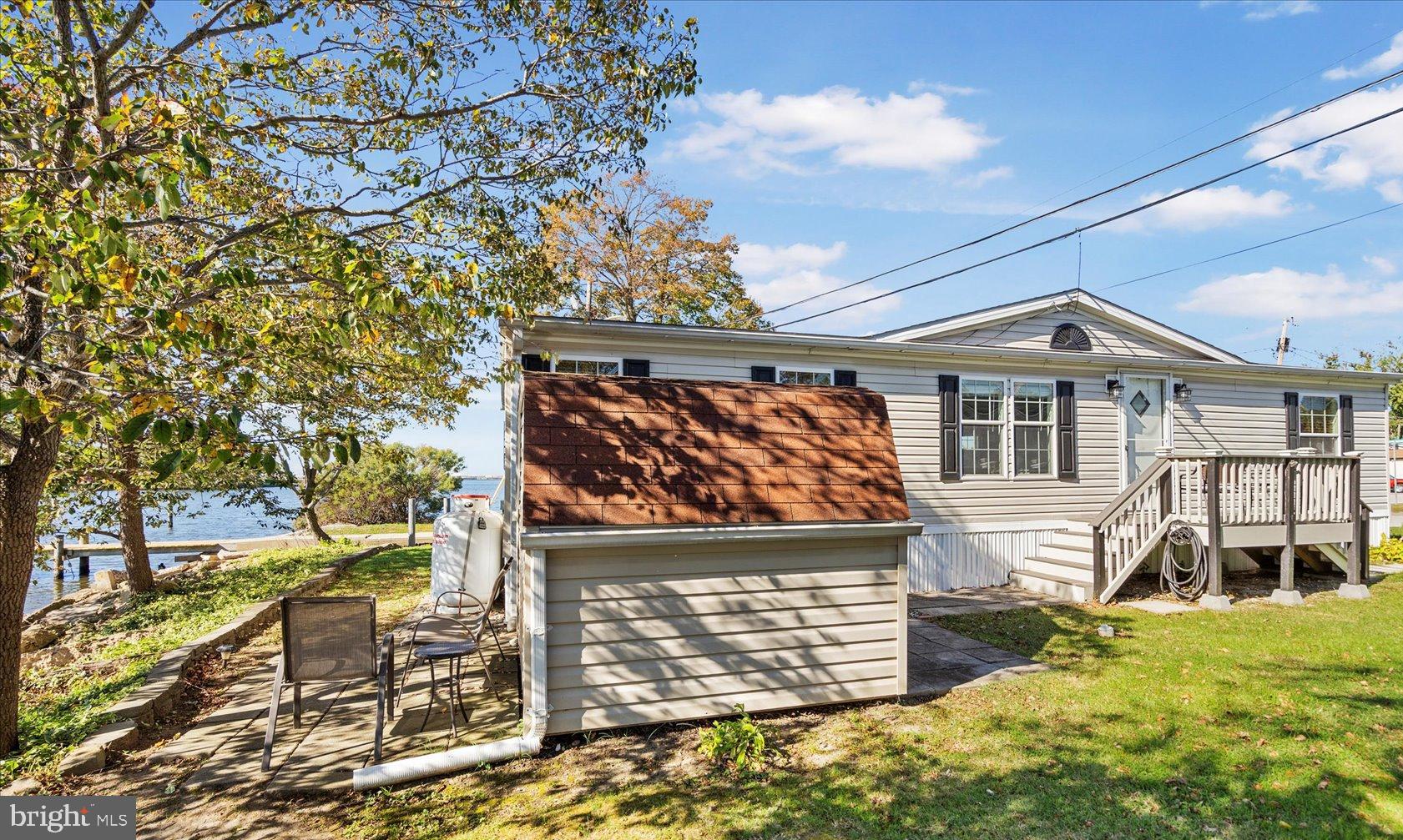 28 Shore Road Sparrows Point, MD 21219 - Photo 19 of 20 front view of a house with a street