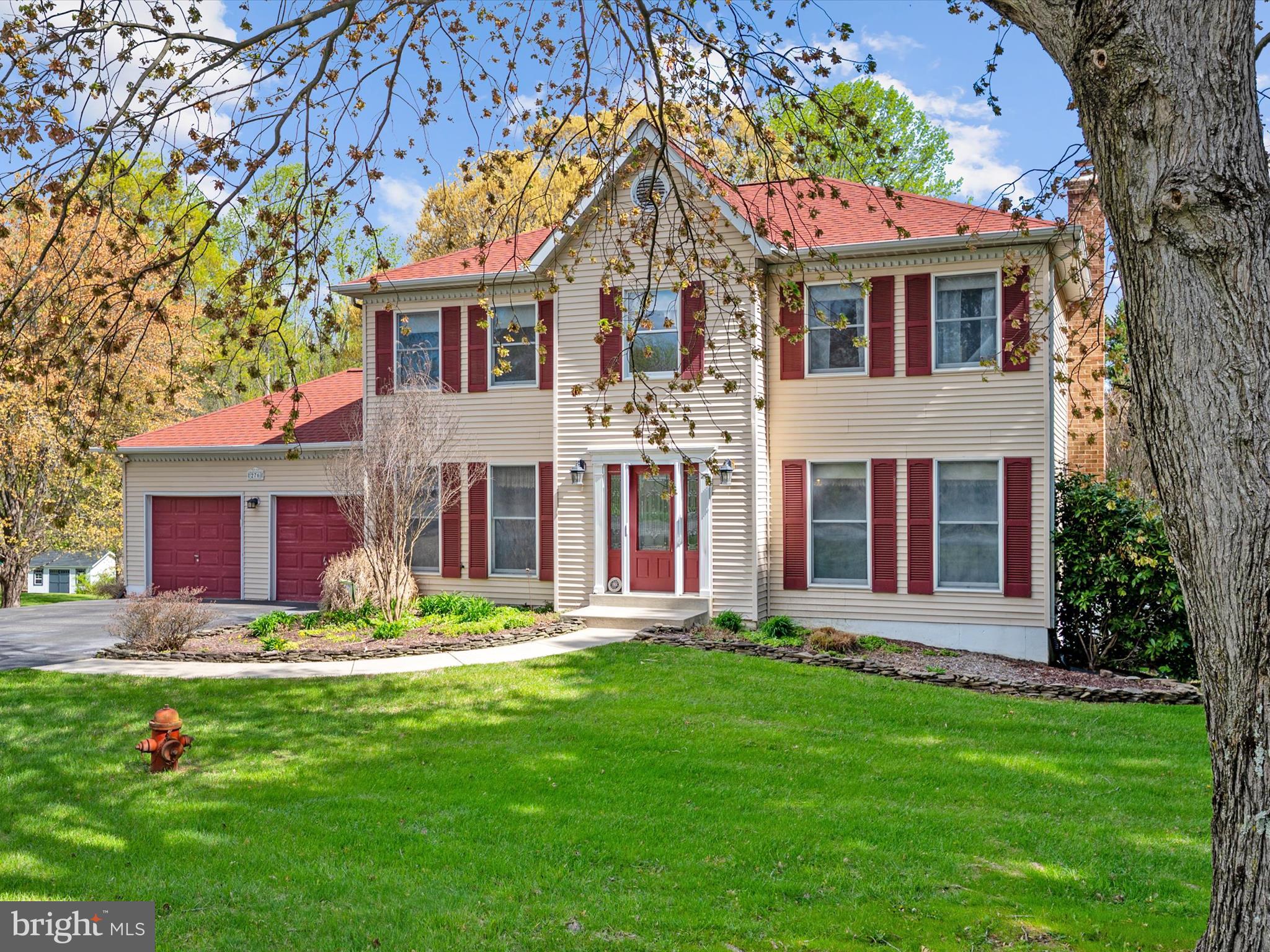 276 Greenridge Drive Dunkirk, MD 20754 - Photo 2 of 49 a front view of house with yard and green space