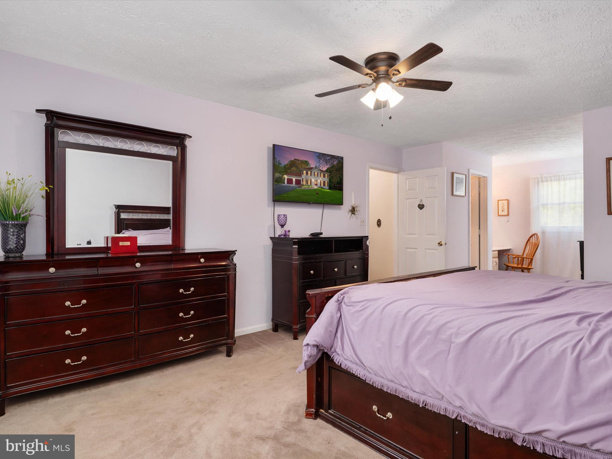276 Greenridge Drive Dunkirk, MD 20754 - Photo 22 of 49 a bedroom with a bed and a dresser