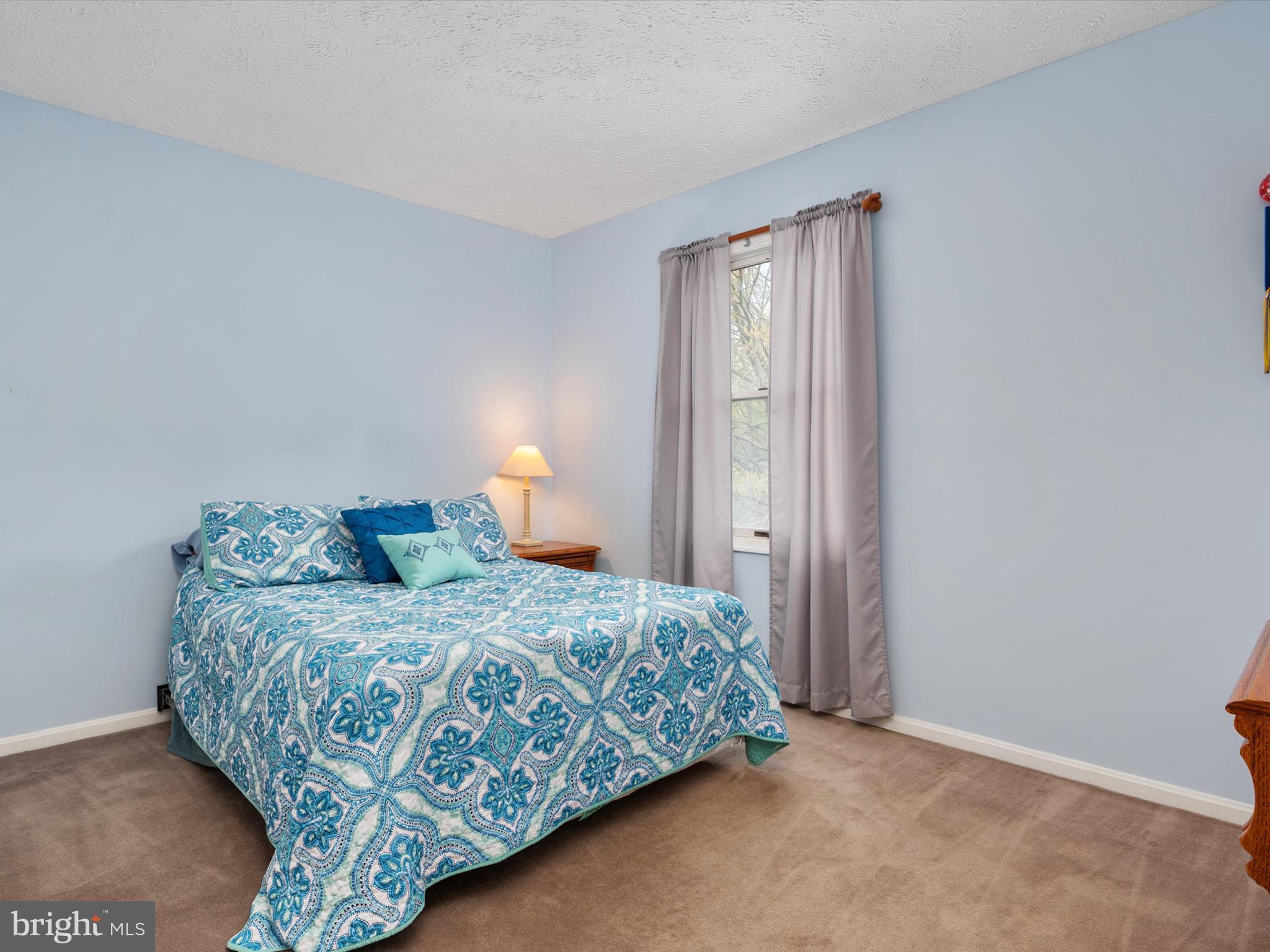 276 Greenridge Drive Dunkirk, MD 20754 - Photo 27 of 49 a bedroom with a bed and a window