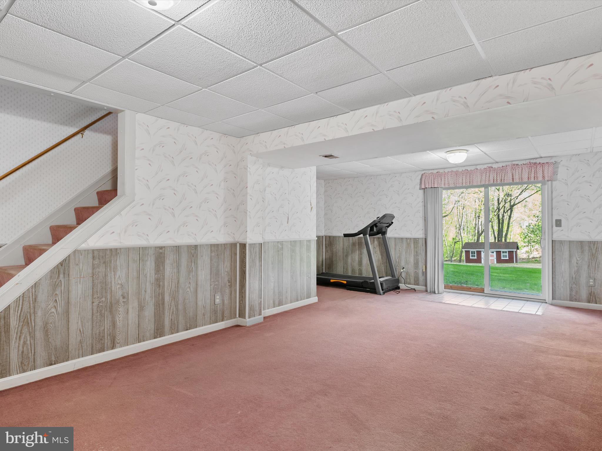 276 Greenridge Drive Dunkirk, MD 20754 - Photo 33 of 49 a view of a room with furniture and a large window