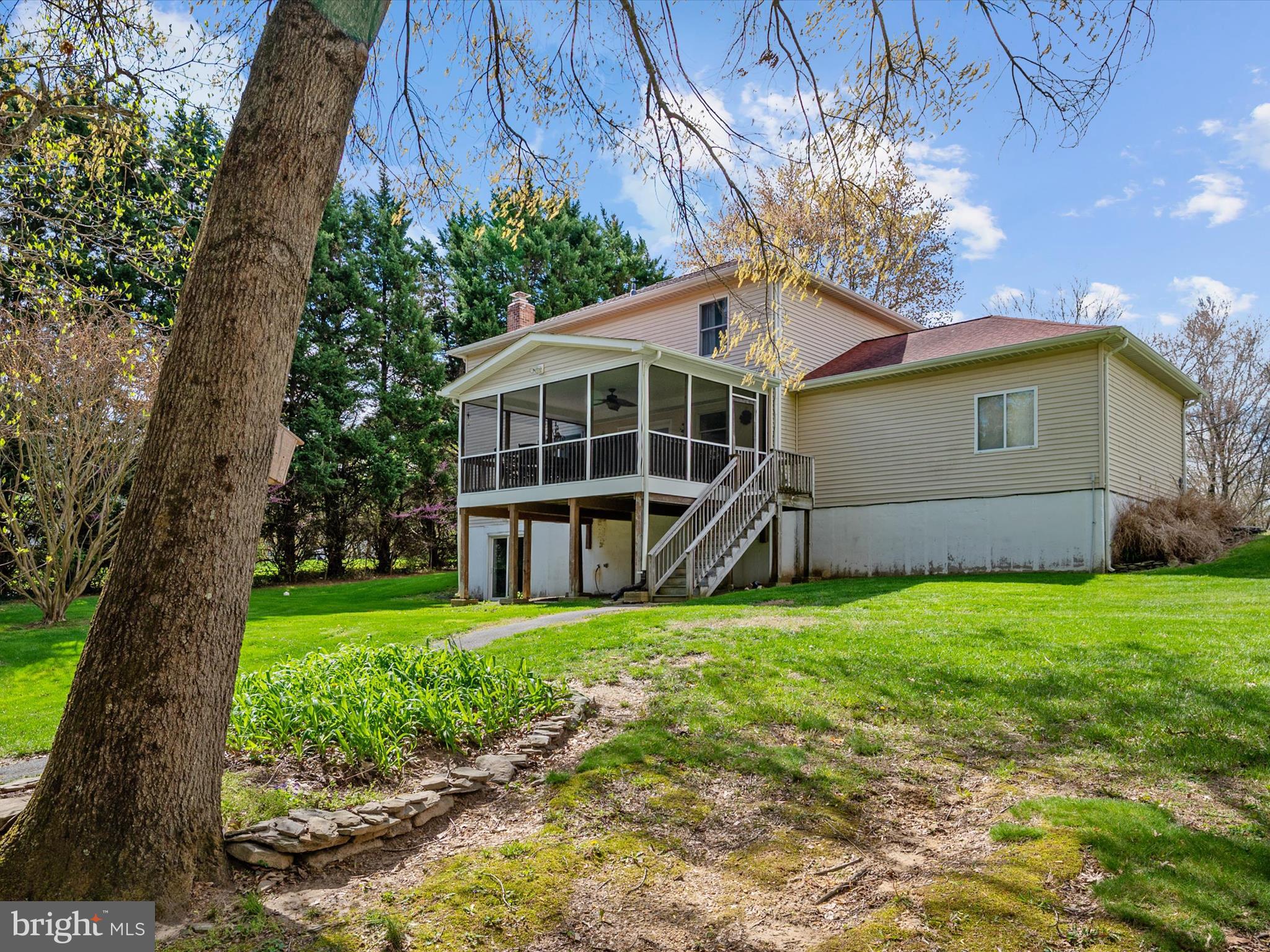 276 Greenridge Drive Dunkirk, MD 20754 - Photo 45 of 49 a view of a house with a yard and large tree
