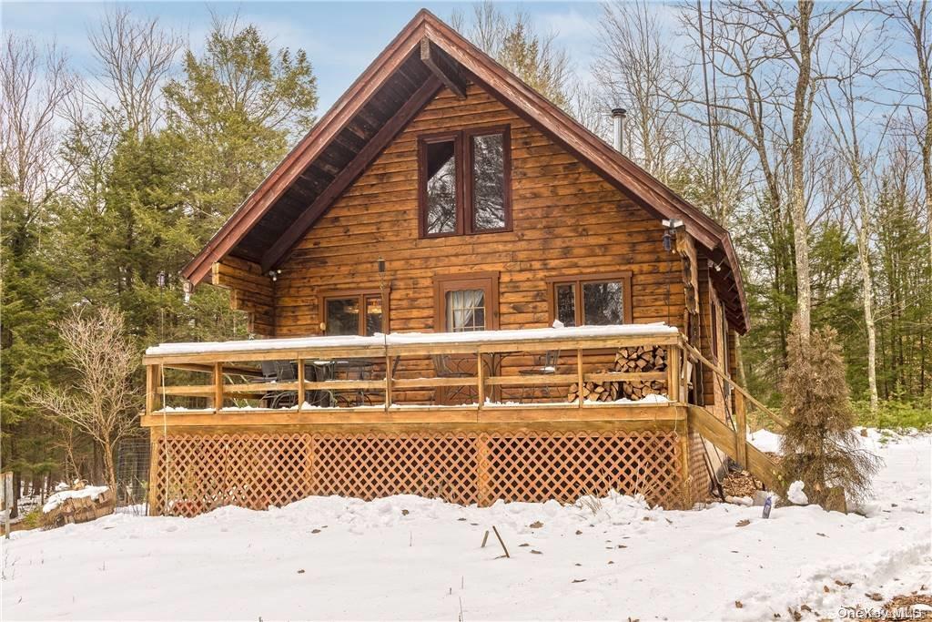 835 Ulster Heights Road Wawarsing, NY 12428 - Photo 16 of 24 a front view of a house with a yard