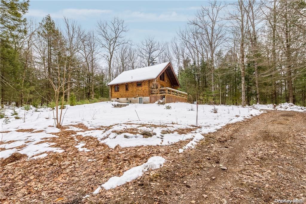 835 Ulster Heights Road Wawarsing, NY 12428 - Photo 18 of 24 a street view covered with snow