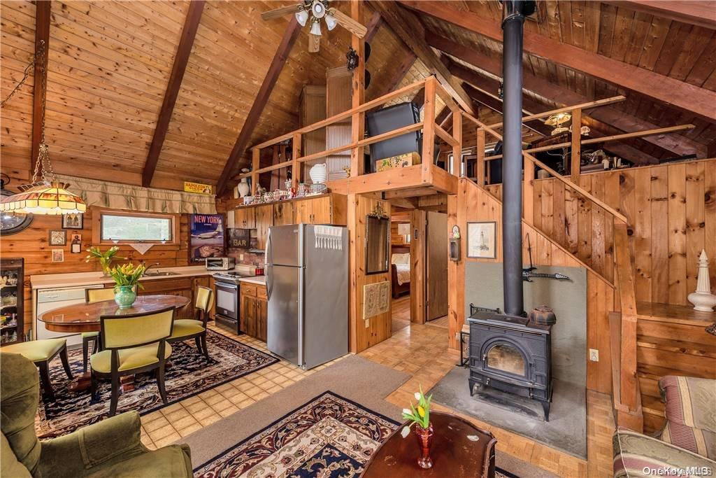 835 Ulster Heights Road Wawarsing, NY 12428 - Photo 5 of 24 a building outdoor space with patio furniture