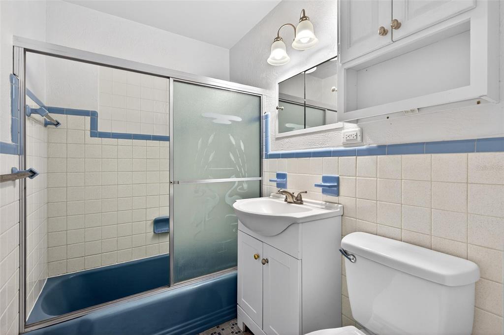 47 Carol Road Ormond Beach, FL 32176 - Photo 21 of 54 a bathroom with a sink a toilet and shower
