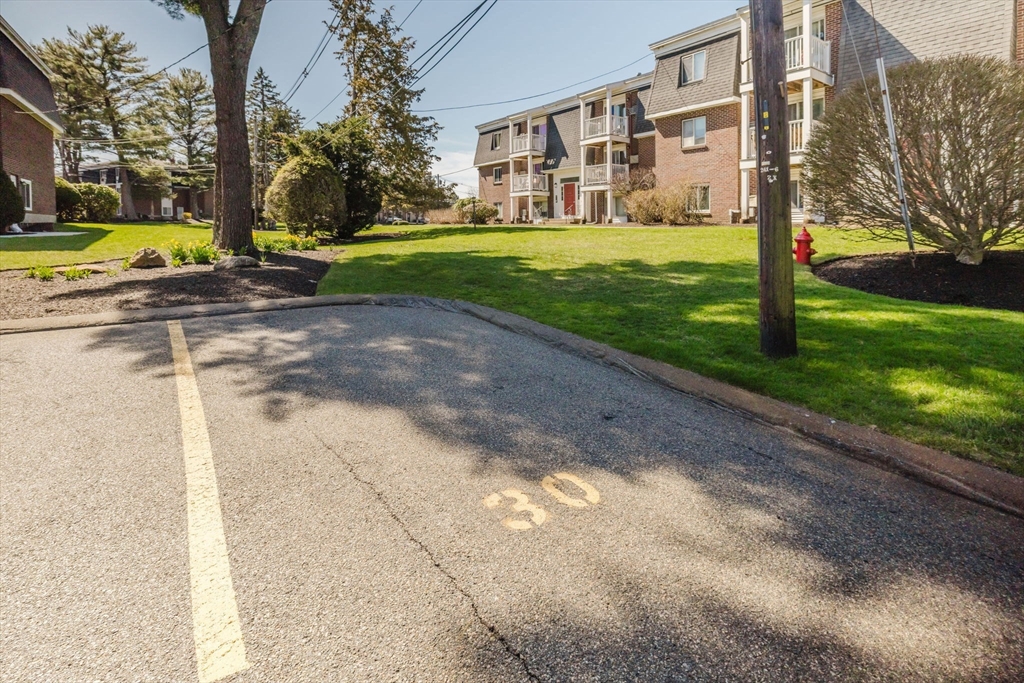 43 Will Drive, Unit 30 Canton, MA 02021 - Photo 23 of 25 a view of a house with a yard