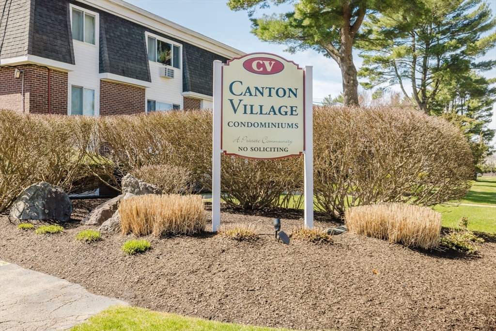 43 Will Drive, Unit 30 Canton, MA 02021 - Photo 24 of 25 a sign that is sitting on a brick wall