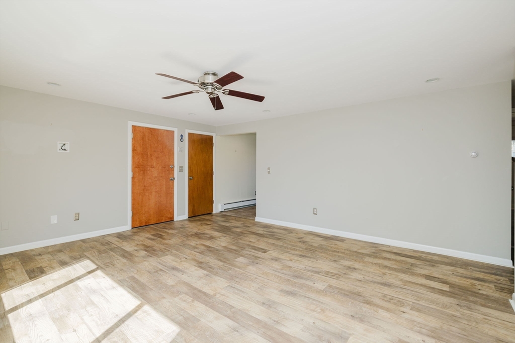 43 Will Drive, Unit 30 Canton, MA 02021 - Photo 6 of 25 a view of room with ceiling fan and window