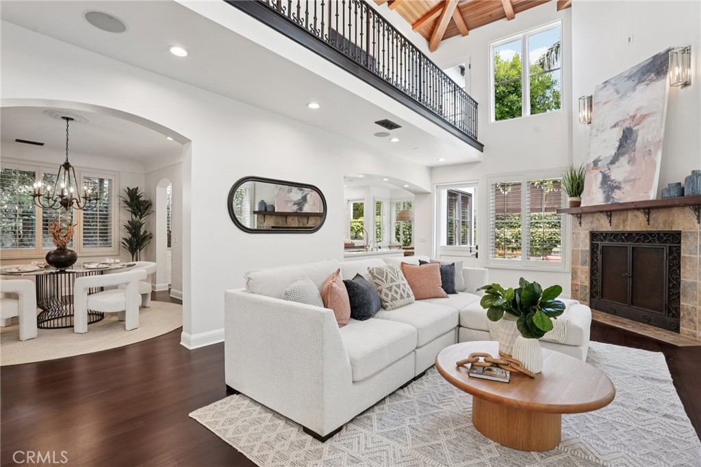 587 26th Street Manhattan Beach, CA 90266 - Photo 13 of 67 a living room with furniture potted plant and a fireplace