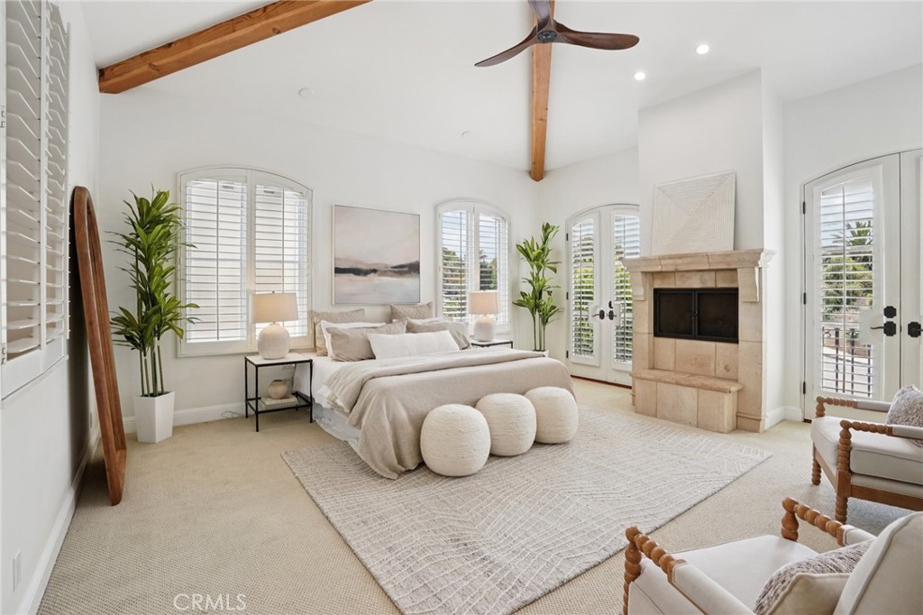 587 26th Street Manhattan Beach, CA 90266 - Photo 28 of 67 a bedroom with furniture and a flat screen tv