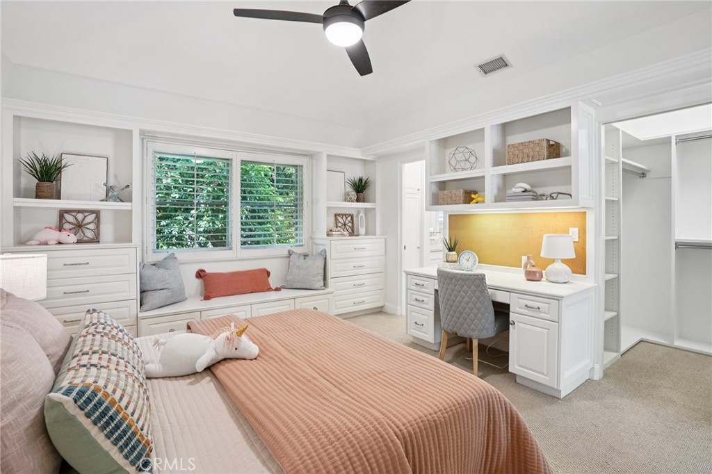 587 26th Street Manhattan Beach, CA 90266 - Photo 36 of 67 a bedroom with a bed and wooden floor