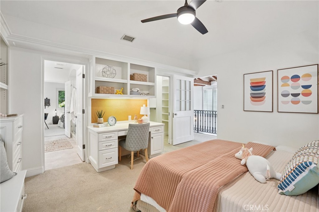 587 26th Street Manhattan Beach, CA 90266 - Photo 38 of 67 a bedroom that has a bed and a desk in it