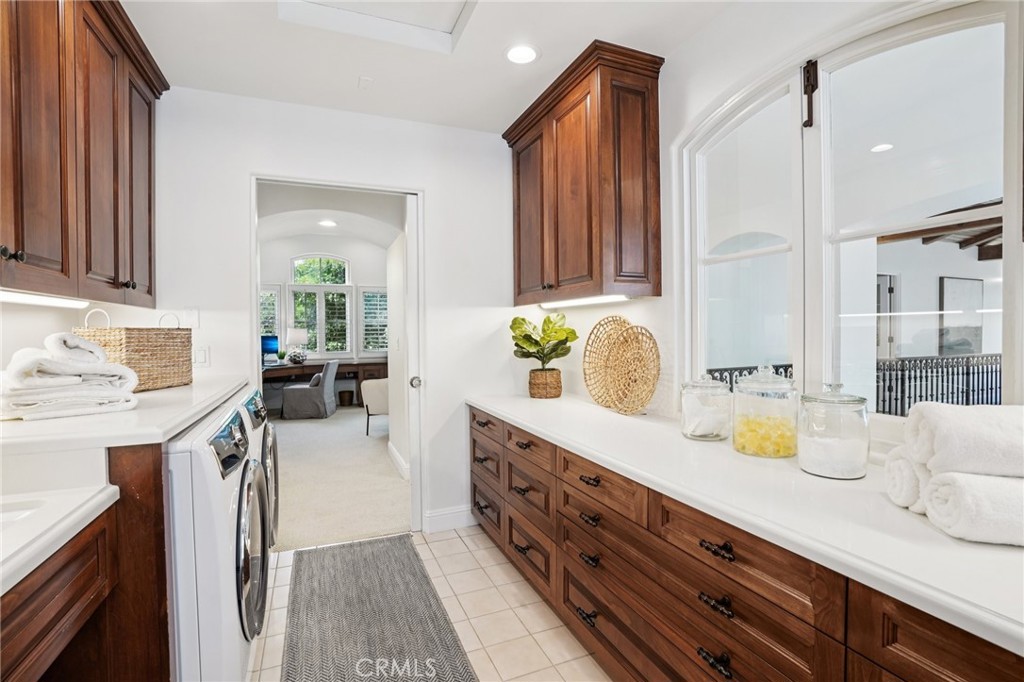 587 26th Street Manhattan Beach, CA 90266 - Photo 44 of 67 a spacious bathroom with a granite countertop double vanity sink a mirror and a shower