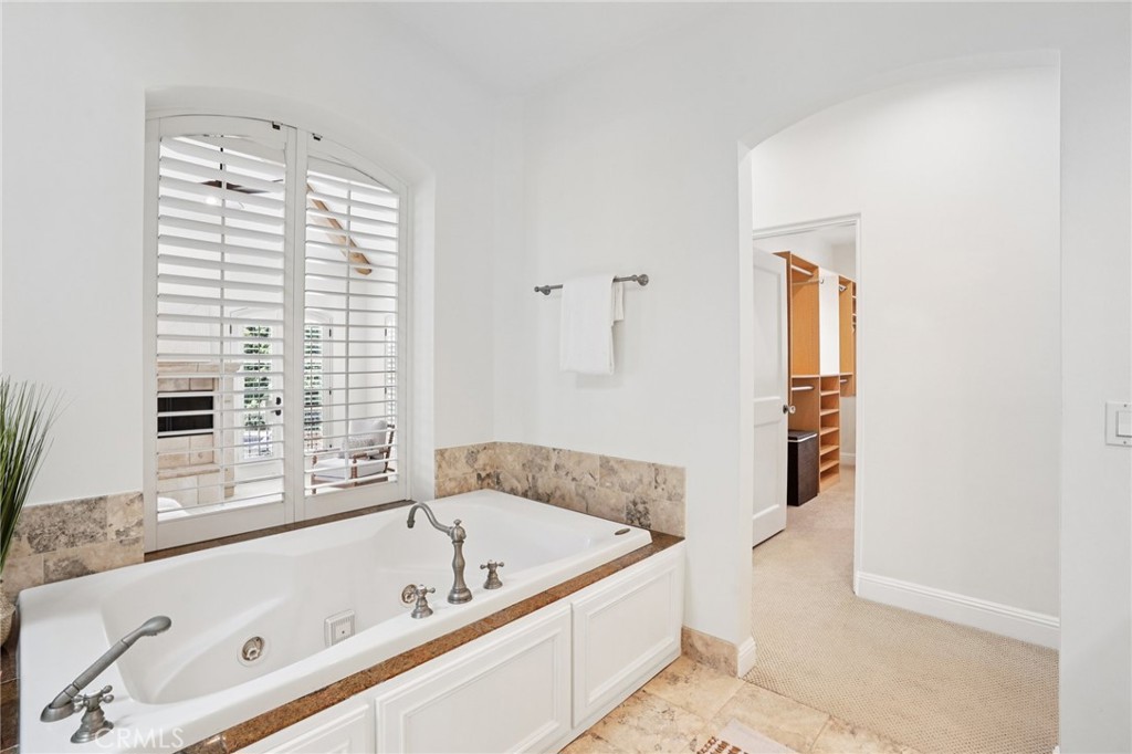 587 26th Street Manhattan Beach, CA 90266 - Photo 51 of 67 a bathroom with a bathtub and a shower