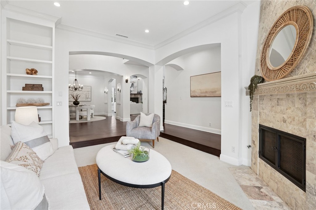 587 26th Street Manhattan Beach, CA 90266 - Photo 8 of 67 a living room with furniture and a fireplace