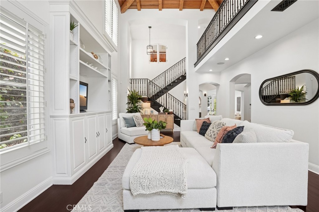 587 26th Street Manhattan Beach, CA 90266 - Photo 10 of 67 a living room with furniture and a chandelier