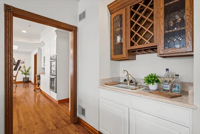 a view of a kitchen with sink and dishwasher