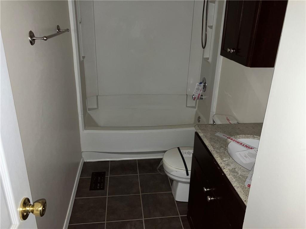 54 Bock Lane Baden, PA 15005 - Photo 15 of 25 a bathroom with a granite countertop sink toilet and shower