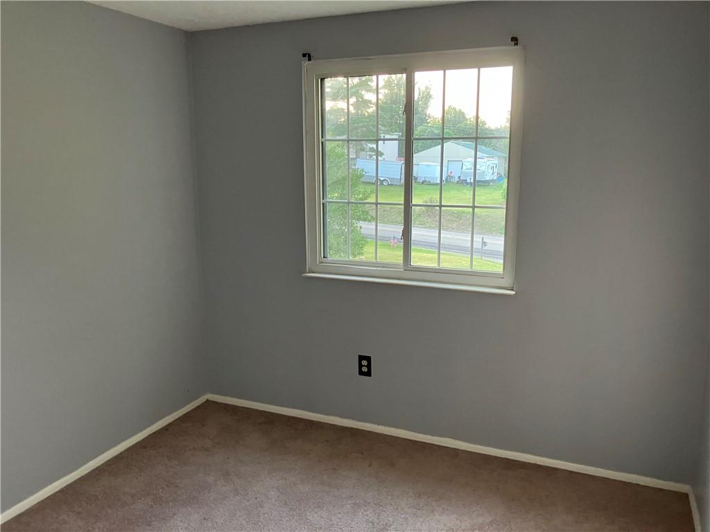 54 Bock Lane Baden, PA 15005 - Photo 18 of 25 an empty room with a window