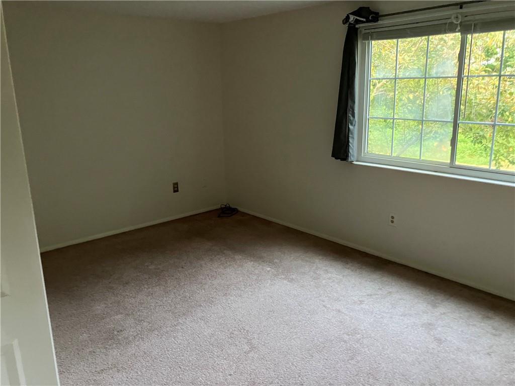 54 Bock Lane Baden, PA 15005 - Photo 20 of 25 an empty room with a window