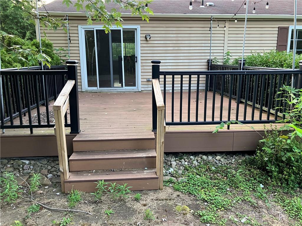 54 Bock Lane Baden, PA 15005 - Photo 4 of 25 a view of a deck with a yard