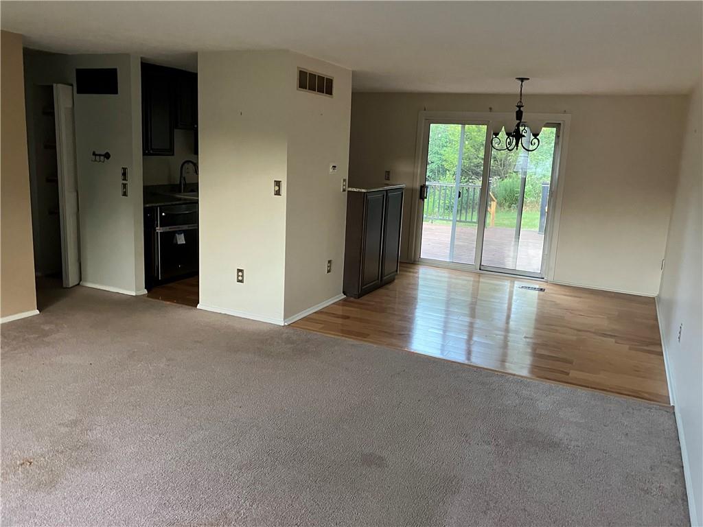 54 Bock Lane Baden, PA 15005 - Photo 7 of 25 a view of an empty room with a window