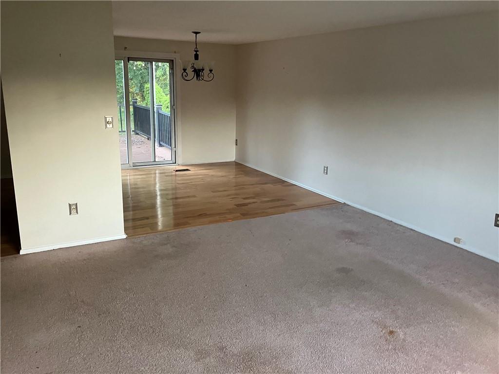 54 Bock Lane Baden, PA 15005 - Photo 8 of 25 an empty room with windows and entrance