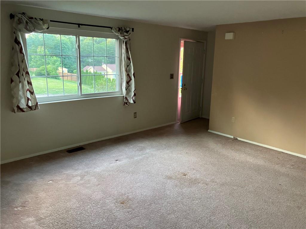54 Bock Lane Baden, PA 15005 - Photo 9 of 25 an empty room with a window
