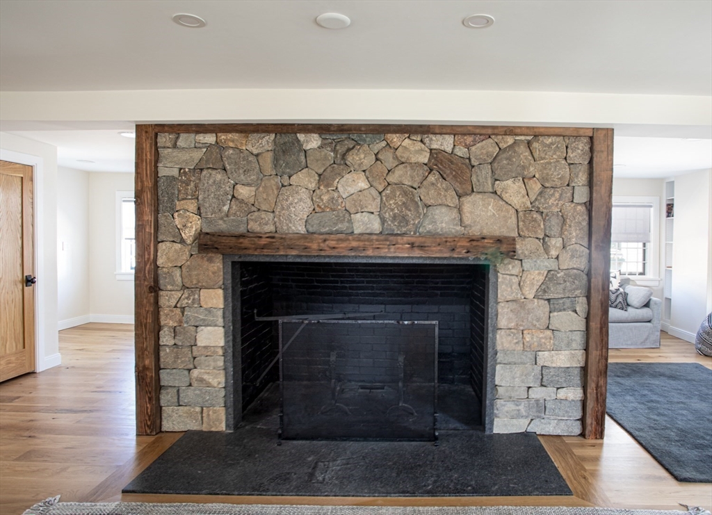 2043 Main Road Westport, MA 02791 - Photo 20 of 42 a living room with a fireplace