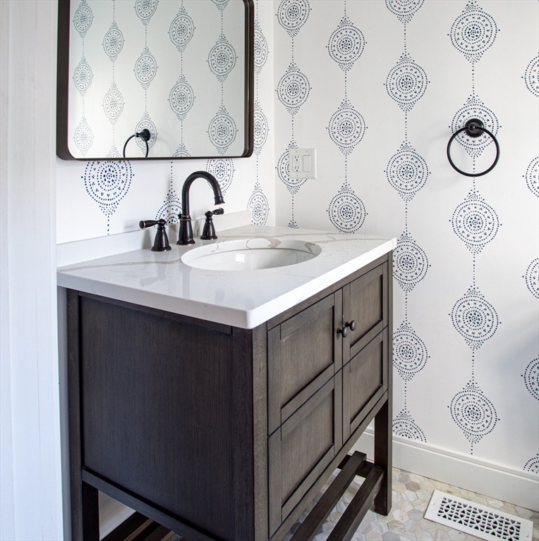 2043 Main Road Westport, MA 02791 - Photo 23 of 42 a bathroom with a sink and a mirror