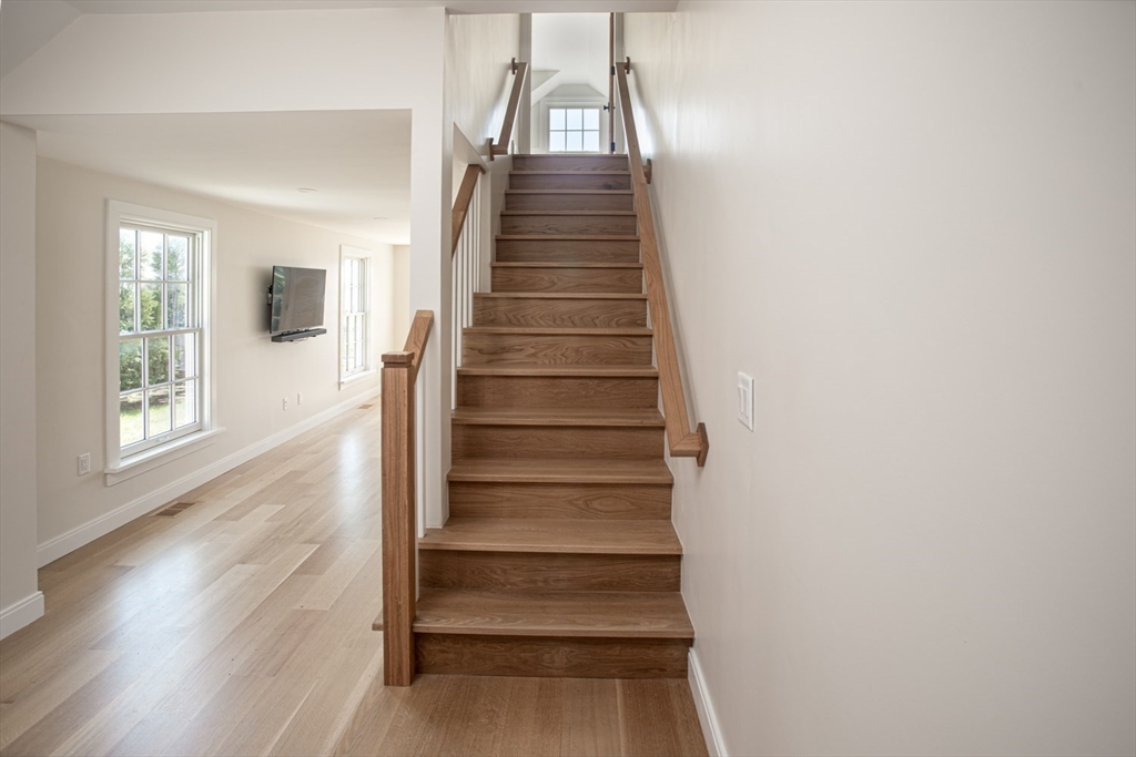 2043 Main Road Westport, MA 02791 - Photo 24 of 42 a view of entryway and hall with wooden floor