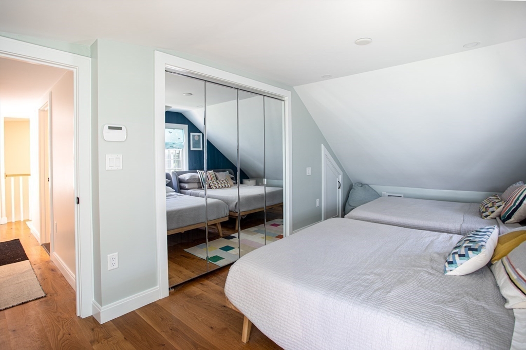 2043 Main Road Westport, MA 02791 - Photo 30 of 42 a bedroom with a bed and a closet