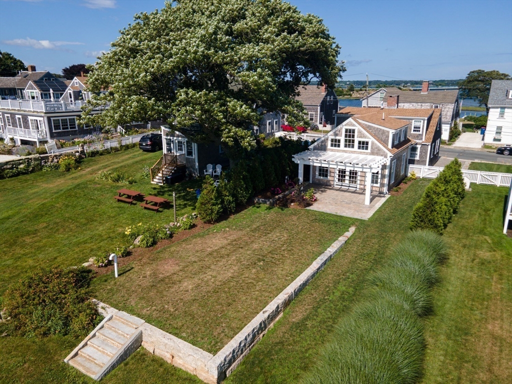 2043 Main Road Westport, MA 02791 - Photo 3 of 42 an aerial view of residential houses with yard and swimming pool