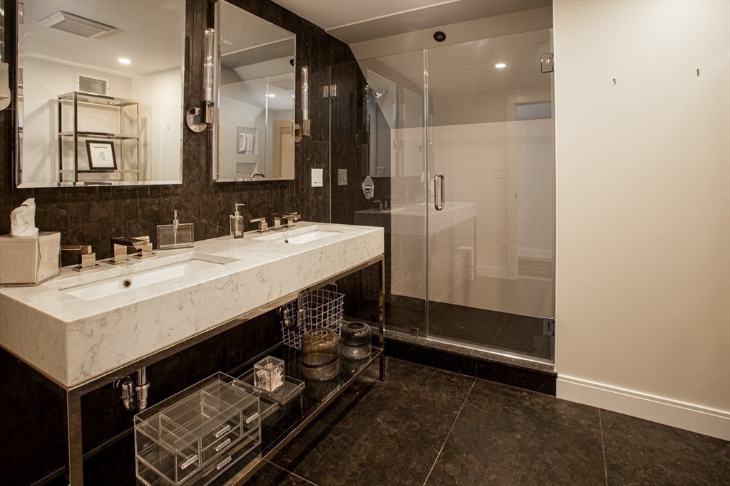 2043 Main Road Westport, MA 02791 - Photo 32 of 42 a bathroom with a sink double vanity and a mirror