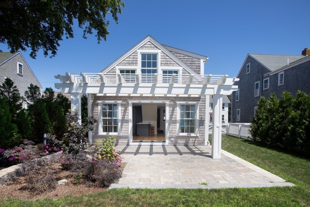 2043 Main Road Westport, MA 02791 - Photo 35 of 42 a front view of a house with garden